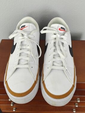 Nike Women's White Sneakers with Black Swoosh and Tan Trim, Size 11